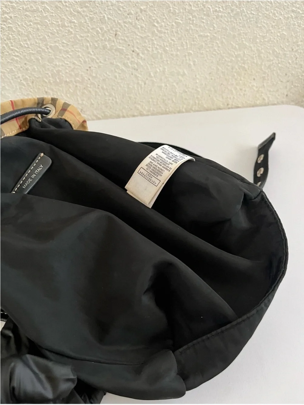 Burberry Nova Check Backpack with black trim and top handle excellent condition